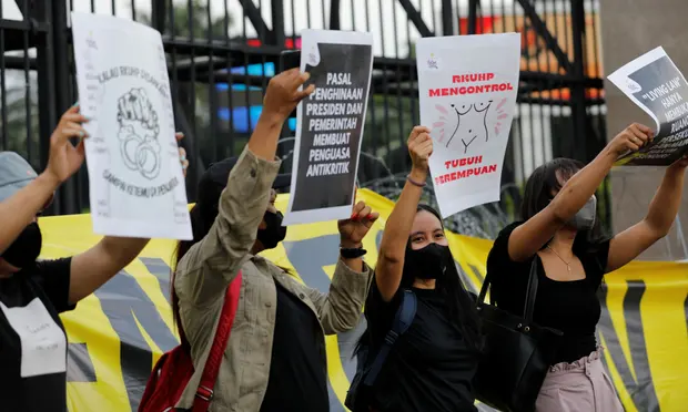 Indonesian lawmakers adopt a bill outlawing extramarital sex 