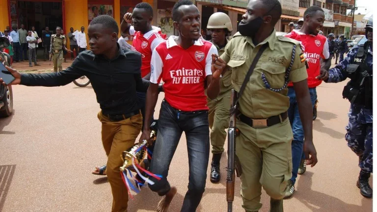 Arsenal Supporters Detained in Uganda after Celebrating Manchester United Victory