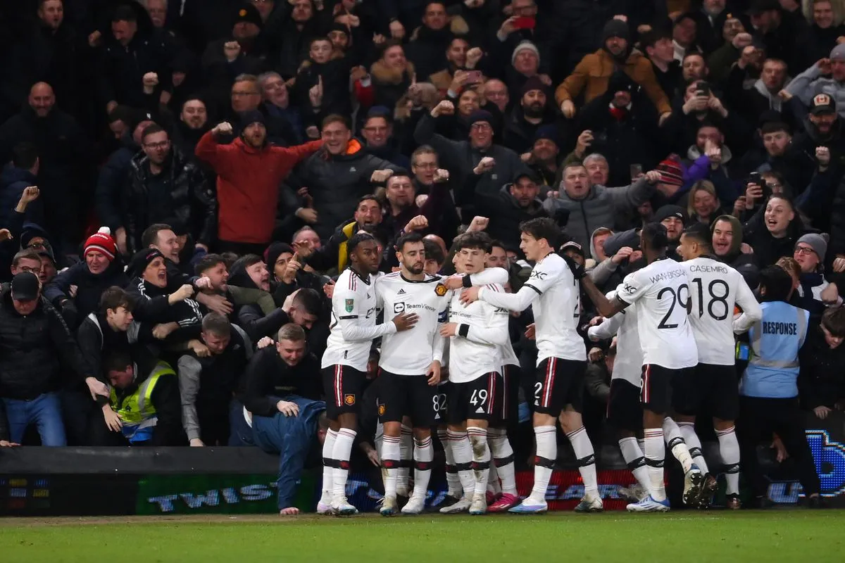 Manchester United players celebrate Bruno Fernandes' goal in the Carabao Cup semi-final first-leg fixture (Photo: Laurence Griffiths/Getty Images)