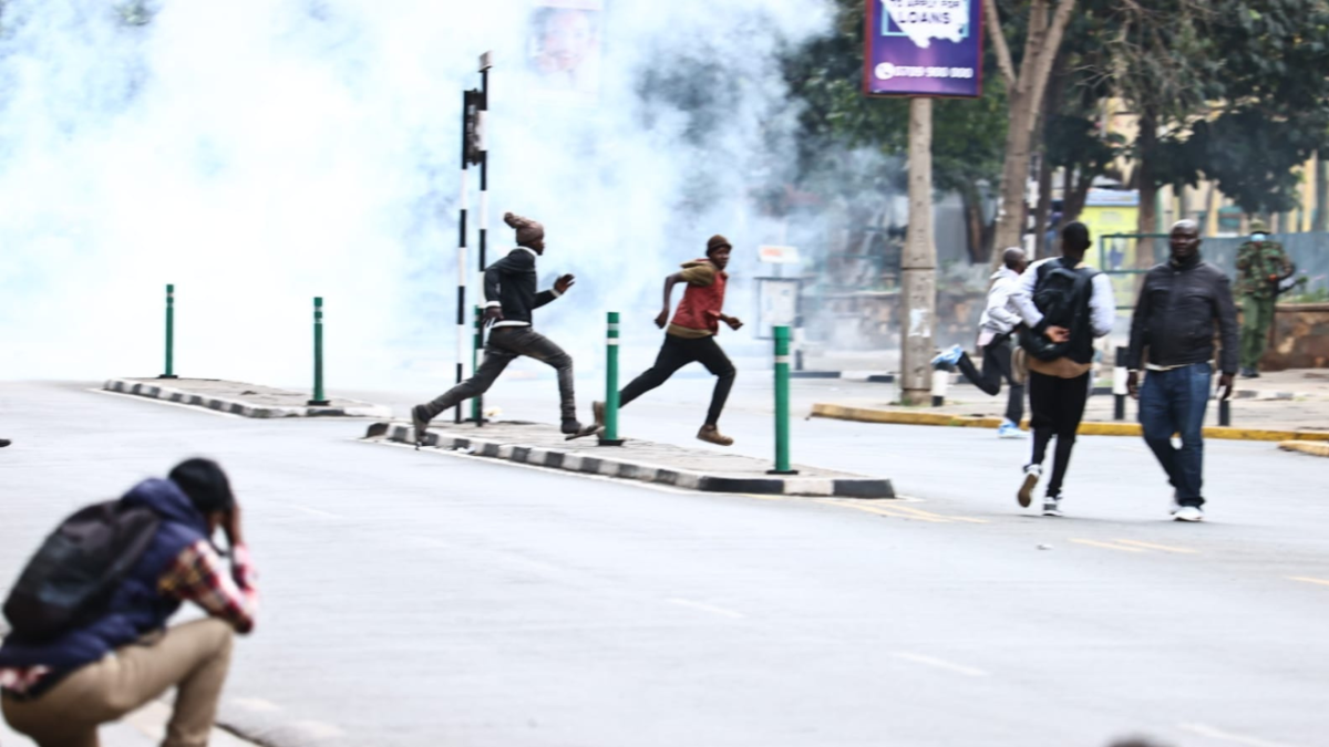 Protesters running away from Tear gas at Kencom Nairobi, Kenya on 20/03/23 during Kenyan Protests [Photo/Courtesy]