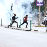 Protesters running away from Tear gas at Kencom Nairobi, Kenya on 20/03/23 during Kenyan Protests [Photo/Courtesy]