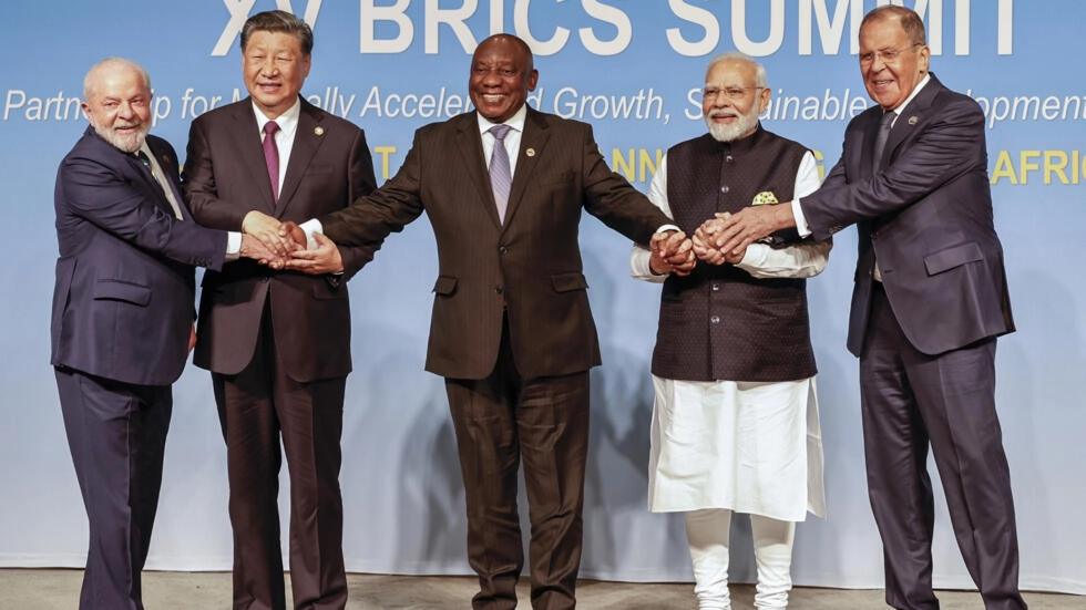 (From L to R) Brazilian President Luiz Inacio Lula da Silva, Chinese President Xi Jinping, South African President Cyril Ramaphosa, Indian Prime Minister Narendra Modi and Russian Foreign Minister Sergei Lavrov pose for a photo during the 2023 BRICS summit in Johannesburg, South Africa on August 23, 2023. [Gianluigi Guercia/AFP]