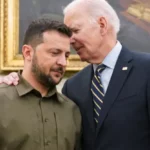 U.S. President Joe Biden puts his arm around Ukrainian President Volodymyr Zelenskyy and whispers to him as they meet in the Oval Office of the White House in Washington, September 21, 2023. Kevin Lamarque | Reuters