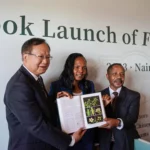 Wang Qingfeng (L), director of the Wuhan Botanical Garden of the Chinese Academy of Sciences, Mary Gikungu (C), the director-general of the National Museums of Kenya, and Geoffrey Mwachala, the chief scientist at the National Museums of Kenya and editor-in-chief of the Flora of Kenya publication, attend a book launch of the 23rd volume "Rubiaceae" of the Flora of Kenya in Nairobi, Kenya, on Sept. 25, 2023. (Xinhua/Li Yahui)