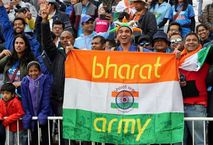 Indian cricket fans with the 'bharat army' flag during international matches. - AP