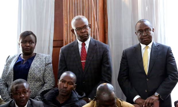 From left, Susan Koech, principal secretary at the Ministry of East Africa Community, Kamau Thugge, principal secretary, and Henry Rotich cabinet secretary at the National Treasury at the Mililani law court in Nairobi, 23 July 2019. They denied fraud-related charges over contracts for the construction of the dams. [Photo/AP]
