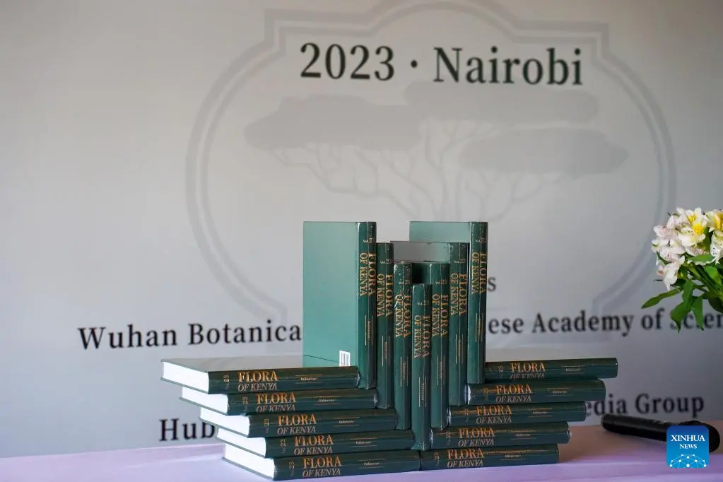 Photo taken on Sept. 25, 2023 shows books of the 23rd volume "Rubiaceae" of the Flora of Kenya at a book launch in Nairobi, Kenya. (Xinhua/Li Yahui) Scientists

