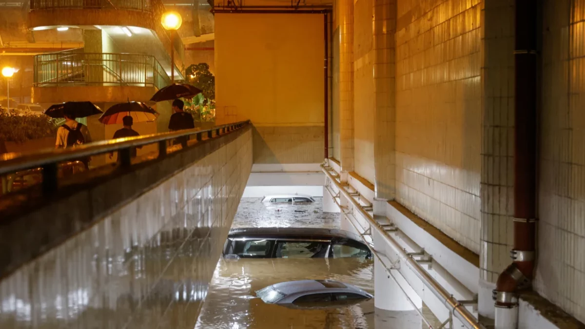 Submerged vehicles in a parking lot in Hong Kong. 