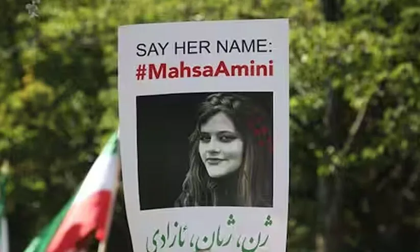 Mahsa Amini, died in detention in Iran after being arrested over dress code violation.