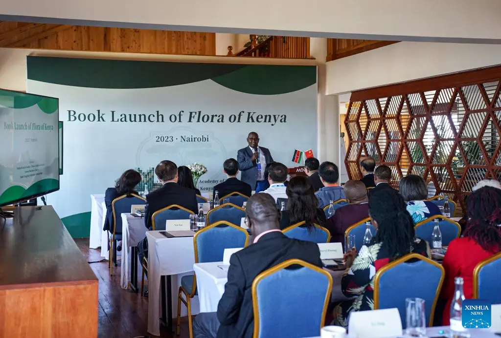 People attend a book launch of the 23rd volume "Rubiaceae" of the Flora of Kenya in Nairobi, Kenya, on Sept. 25, 2023. (Xinhua/Li Yahui) Scientists
