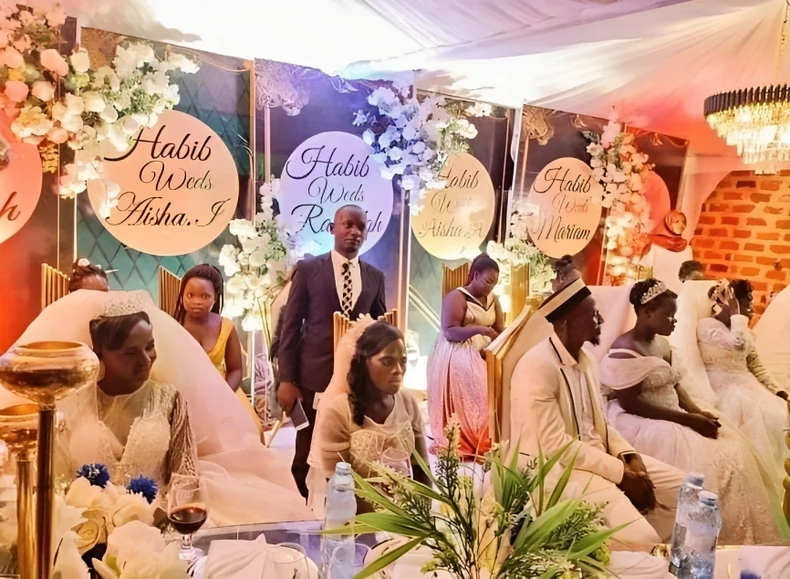 Habib and his wives at the wedding reception. [Photo/Courtesy] Man