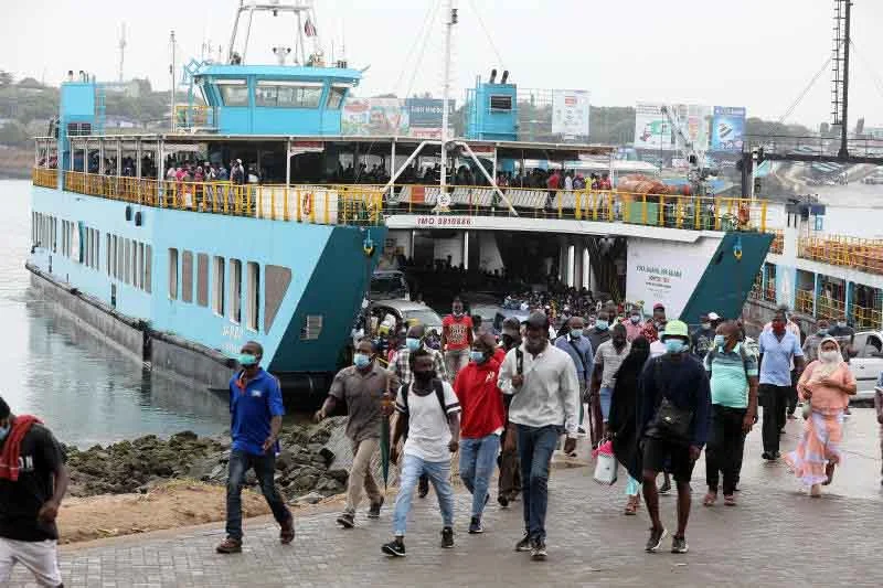 Pedestrians at the Likoni Channel Ferry, Indian Ocean.