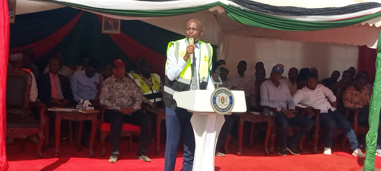 Outgoing Trade and Industry CS Moses Kuria speaking in Garissa. [Photo/STEPHEN ASTARIKO]
