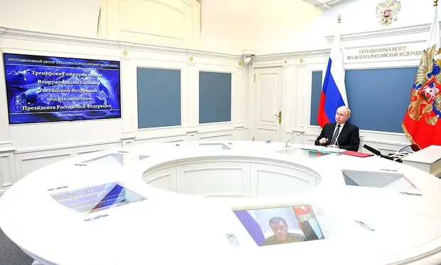 Vladimir Putin attends a nuclear attack drill via video conference in Moscow on October 25, 2023. The Russian president has signed into law Russia withdrawing its ratification of the Comprehensive Nuclear Test Ban Treaty (CTBT). [Photo/Getty Images]