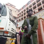 Administration Police, Nairobi City Council Garbage Truck outside Stima Plaza offices, Nairobi.