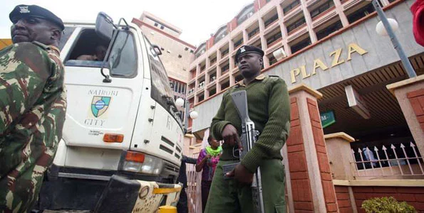 Administration Police, Nairobi City Council Garbage Truck outside Stima Plaza offices, Nairobi.