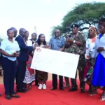 Handing-over-of-a-cheque-in-Kitui-County