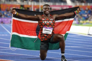 Sprinter-Ferdinand-Omanyala-celebrates-with-the-Kenyan-sprinter-Ferdinand-Omanyala-celebrates-with-the-flag-after-winning-Gold-in-100m-final-at-Commonwelath-Games-og_image