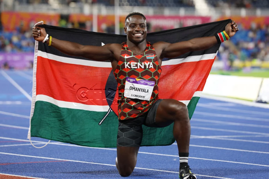 Sprinter-Ferdinand-Omanyala-celebrates-with-the-Kenyan-sprinter-Ferdinand-Omanyala-celebrates-with-the-flag-after-winning-Gold-in-100m-final-at-Commonwelath-Games-og_image