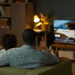 black-man-woman-child-sitting-600nw-2671510093