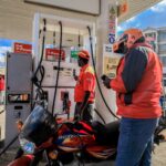 Motorists refuel vehicles at a petrol station as rising fuel prices continue to affect transport, food costs and business operations across Kenya.