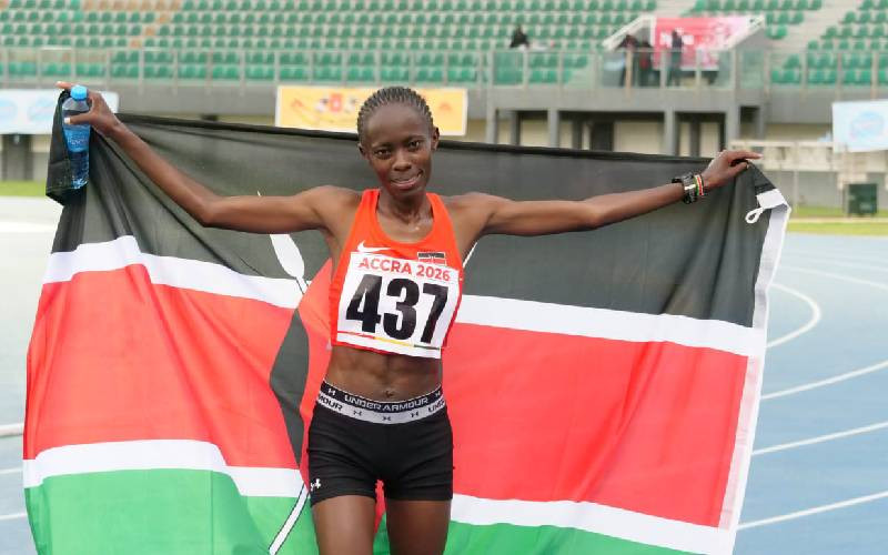 Kenya's Diana Wanza celebrates after winning silver in the women's 10,000 metres at the 2026 Commonwealth Games in Glasgow, finishing behind Australia's Rose Davies.