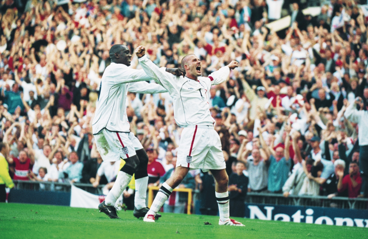 David Beckham celebrates after scoring against Argentina at the 2002 FIFA World Cup, alongside Harry Kane and Lionel Messi ahead of the 2026 World Cup semi-final.