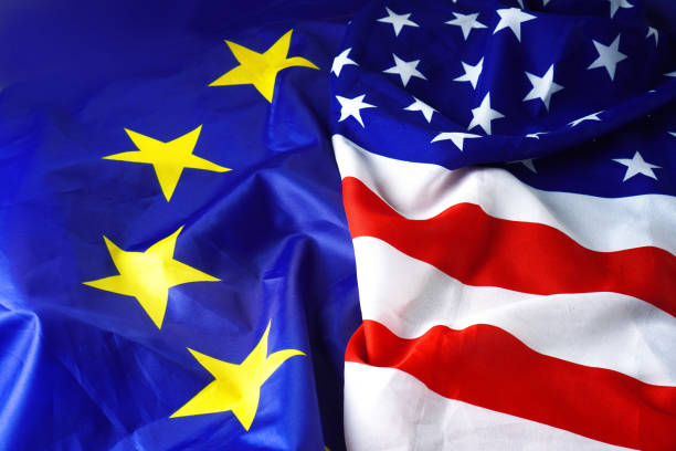 European Union and United States flags displayed together, symbolising tensions over EU regulation of major American technology companies such as Google.
