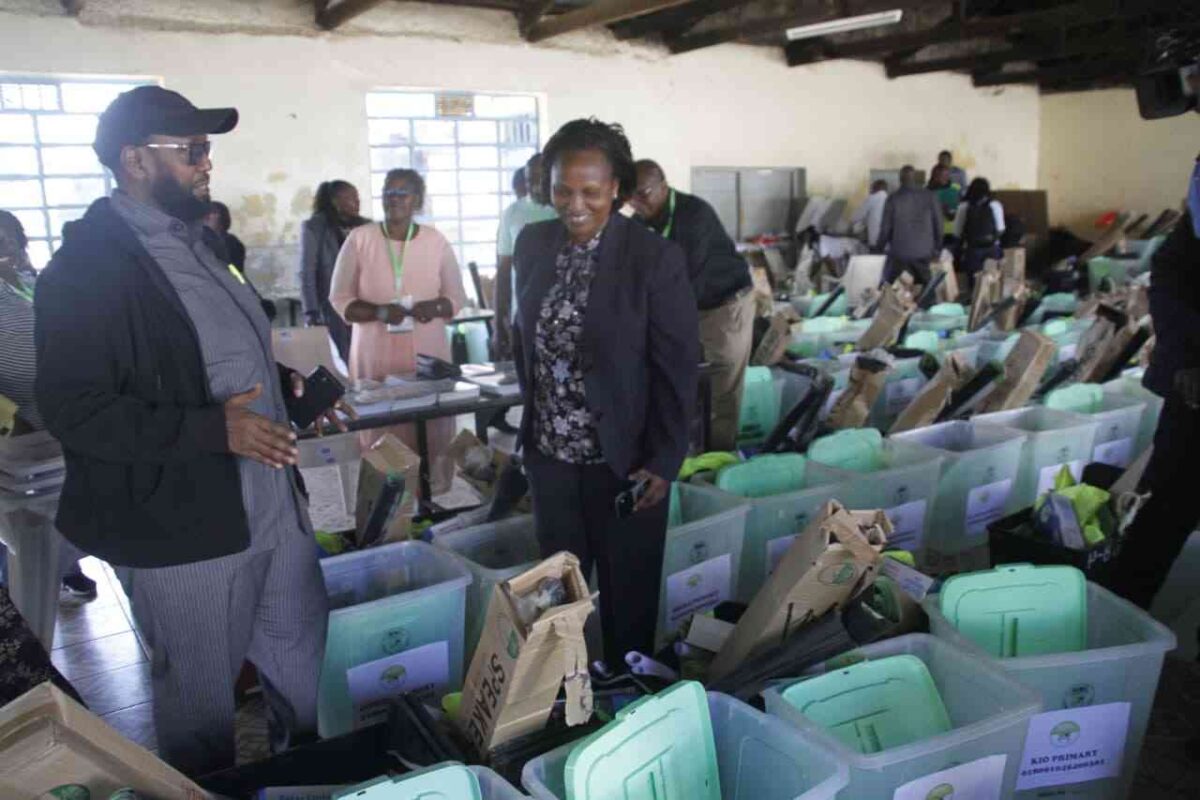 Voters queue at a polling station in Ol Kalou as parliamentary candidates cast their ballots during the by-election supervised by the IEBC.