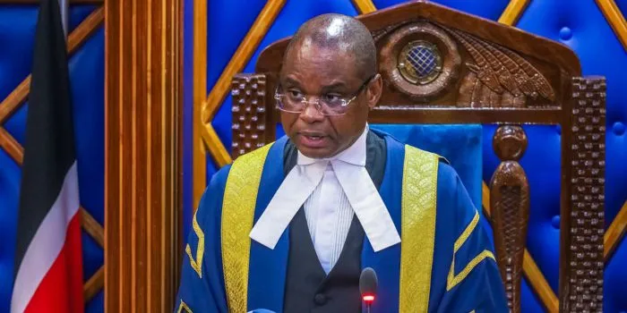 Edwin Sifuna and Eddy Oketch shake hands in the Senate chamber after Speaker Amason Kingi announced ODM's leadership changes replacing Sifuna as Deputy Senate Minority Whip.