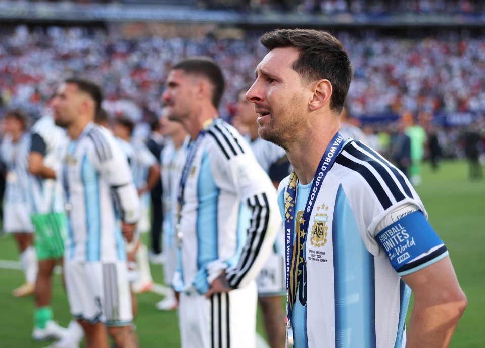 Lionel Messi and Argentina players react after Spain defeated them 1-0 in extra time to win the 2026 FIFA World Cup final.