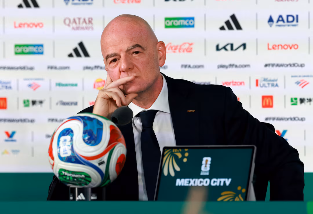 Gianni Infantino, president of FIFA, attends a football event as CONMEBOL continues to support his leadership despite concerns over FIFA's withdrawn investment proposal and governance decisions.