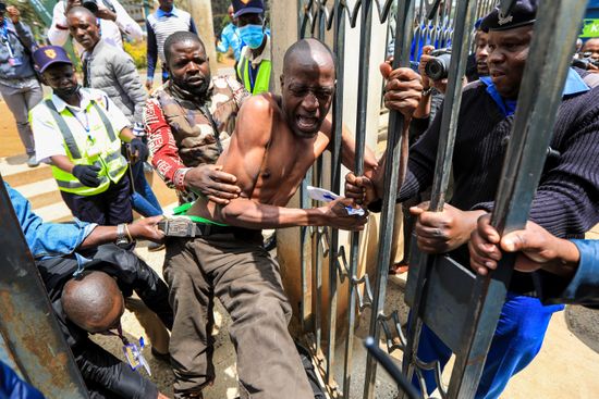 kenyan-activist-julius-kamau-c-dragged-out-550nw-13353139h