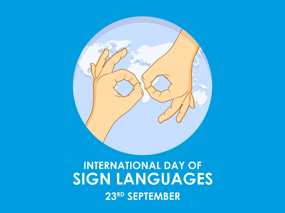 People using sign language as International Day of Sign Languages marks the rights and linguistic diversity of deaf communities around the world.