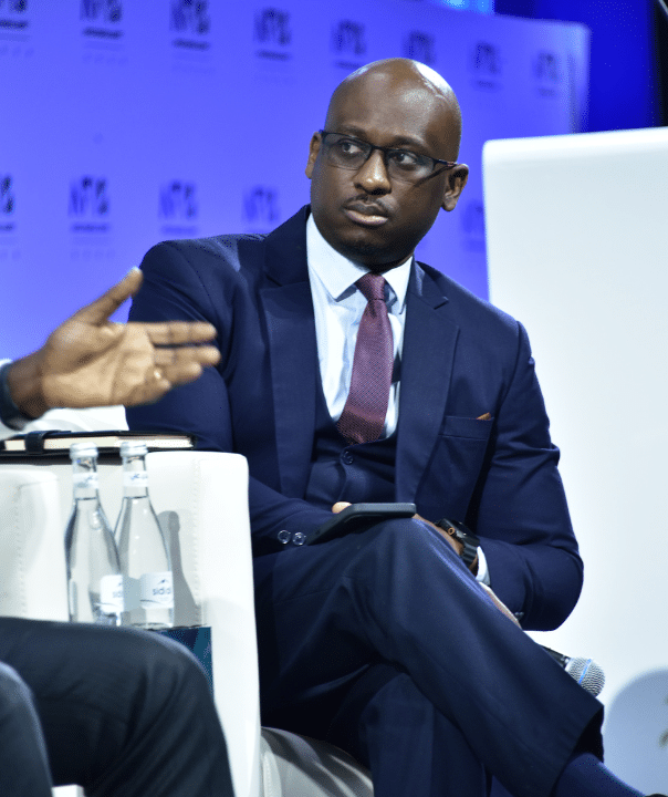 Ramah Nyang working as a Kenyan television journalist during his early career at KTN and Radio Africa Group.
